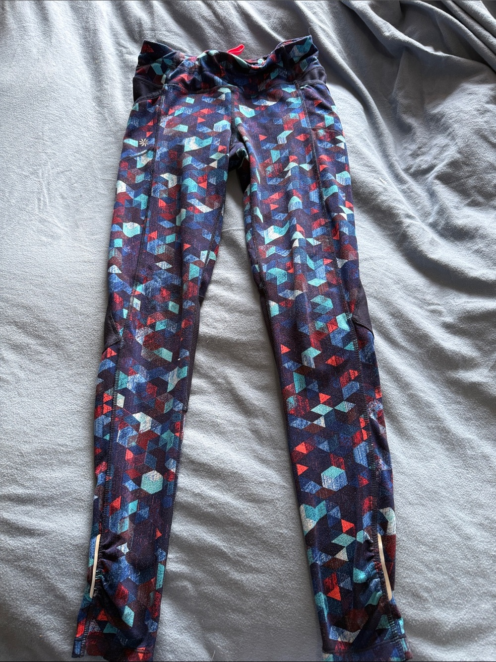 Athleta womens XS Navy Geometric Print Leggings with Red & Teal Accents